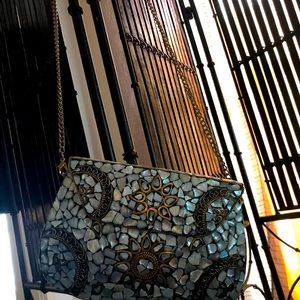 Beautiful brass bohemian styled crossbody bag.